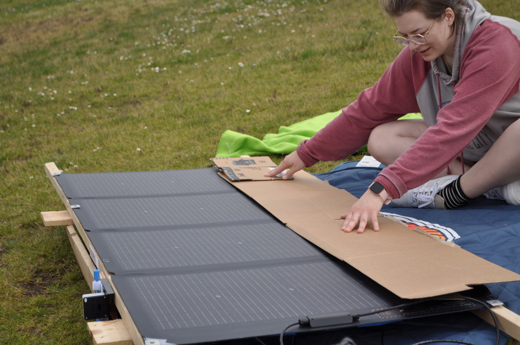 Amanda blocking 25% of all sub-panels with cardboard